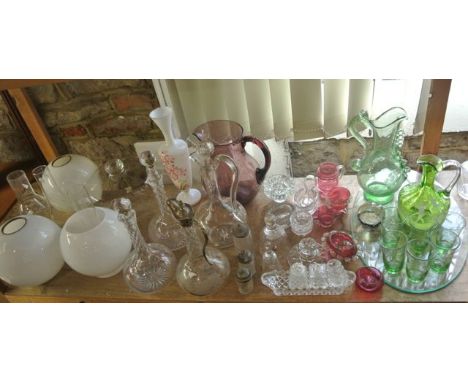 A large collection of glassware to include three opaque glass shades, a large clear glass dome, a pair of shaft and globe dec