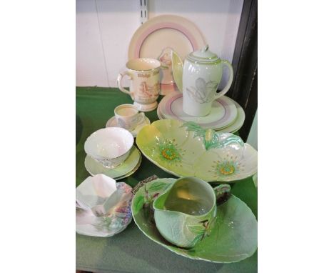 A collection of mainly Art Deco ceramics including a Susie Cooper coffee pot with painted grey and pink stylised feather deco