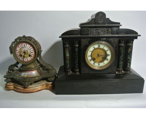 A Victorian black slate and marble mantle clock in the classical style with eight day striking movement, the remains of a 19t