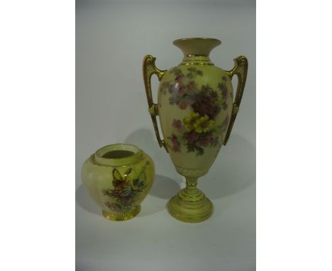 A tall Royal Worcester blush ivory two handled vase with painted and gilded floral sprays, with green printed mark to base nu