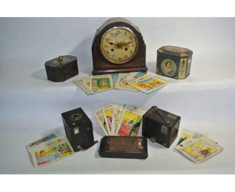 A Kodak Six 20 Brownie C camera, a further 6-20 Brownie Junior camera, a further vintage Kodak camera together with an Art De