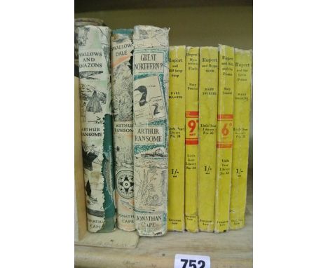 5 volumes of Rupert by Mary Tourtel in yellow bindings, numbers 11, 14, 34, 36 & 40 together with 3 volumes of Arthur Ransom 