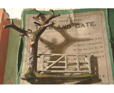 A vintage lead tree and gate Britains 7F, in original box
