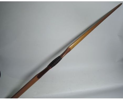 A five foot six inch timber bow marked Jaques Golden Arrow, 28 inch arrow