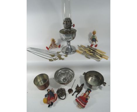 A Durham Cathedral brass door knocker, a chromium plated oil lamp, sundry dolls, etc