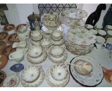 A collection of Ridgway dessert wares with printed yellow daisy sprig decoration comprising a pair of high comports, two low 