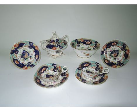 An extensive collection of Victorian tea wares with printed and infilled chinoiserie style floral decoration in red, blue, gr