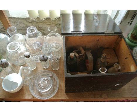 A selection of vintage glass chemist bottles and related effects together with an unusual decanter of ribbed form with metall