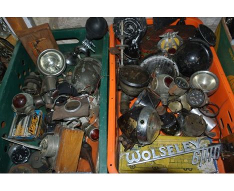 A large collection (2 boxes) of vintage automobile effects to include headlights and lamps including a Federal Electric Co In