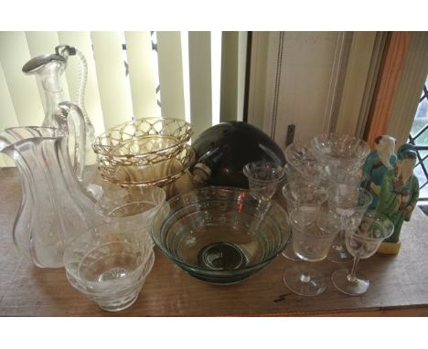 A collection of glassware to include a 19th century claret jug with etched trailing foliate decoration, wrythen moulded handl