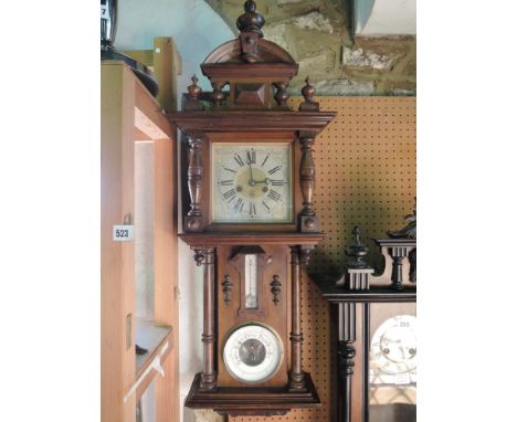 A late 19th century German clock/barometer combination, the eight day striking movement enclosed behind an anodised dial set 