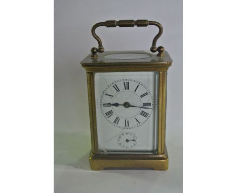 A brass carriage clock with 8 day striking movement 