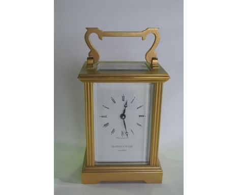 A brass carriage clock with 8 day timepiece - Mappin & Webb, London