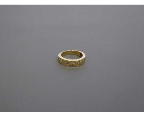 18ct half eternity ring with eight stones 5.2 grams