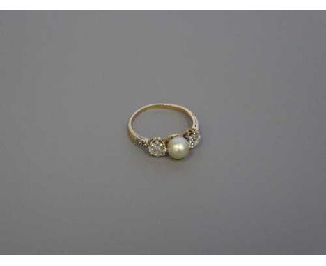 An early 18ct gold pearl and diamond ring