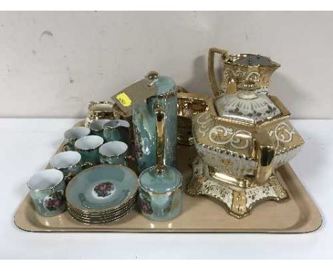 An early 20th century five piece English Pottery tea service and a Japanese lustre coffee set 