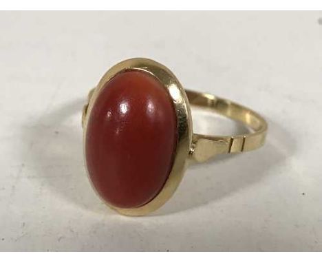 An 18ct gold and coral ring