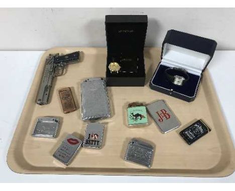 A Tissot wrist watch, together with a Montine wrist watch, a novelty Colt pistol lighter, a lighter incorporated with a cigar