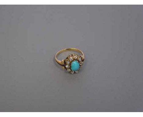 An antique turquoise and diamond cluster ring
