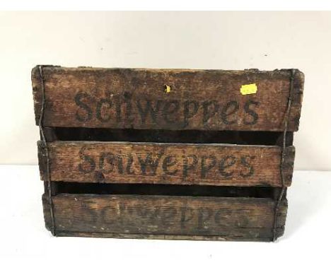 Two vintage wooden Schweppes crates
