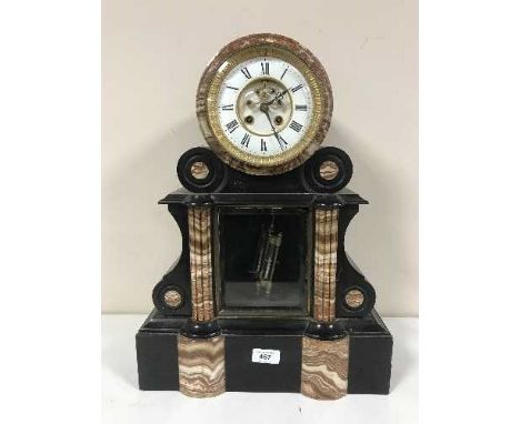 A Victorian two tone French marble mantle clock with open escapement and mercury pendulum 