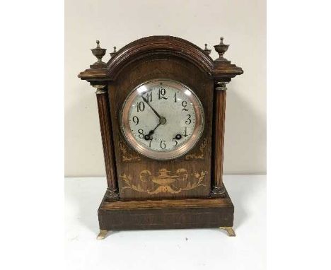 An Edwardian inlaid mahogany quarter-striking eight-day bracket clock, the movement inscribed "Lenzkirch 1 Million" and numbe