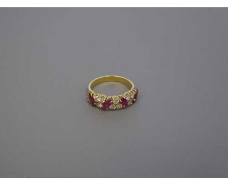 An 18ct gold ruby and diamond ring