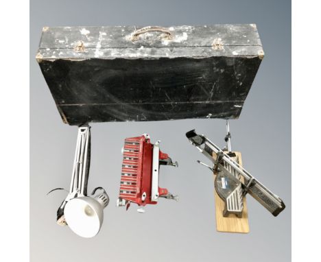 A miter saw, angle poised lamp, joiner's tool box etc 