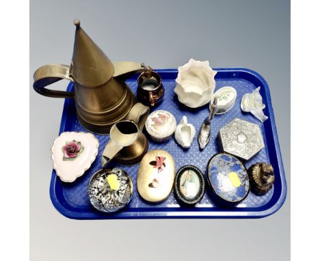 A tray of glass paperweights, trinket boxes, brass bell, two brass jugs 