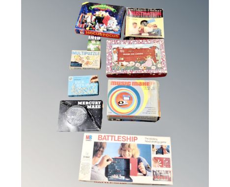 A box of boxed vintage record player, games, playing cards, etc 