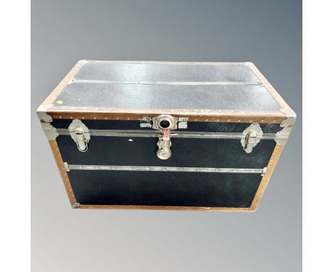 A studded vinyl steamer style shipping trunk, width 91 cm