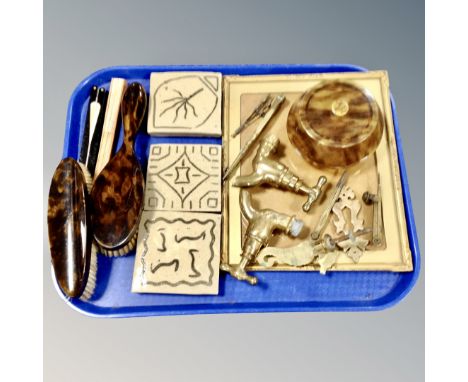 A tray of brass picture frame, brass taps, faux tortoiseshell dressing table brushes, two hand fans  