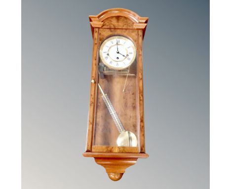 A contemporary Comitti of London eight day wall clock 