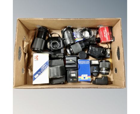 A box of Canon T90 camera body, related accessories Yashica lenses, flashes, etc 