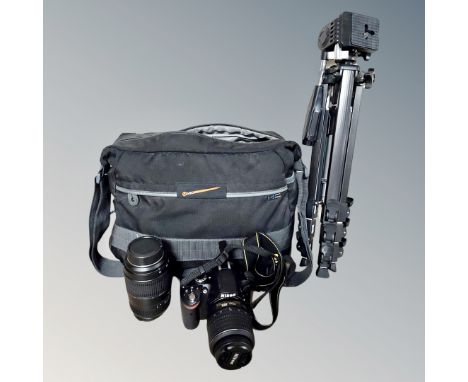 A camera bag of Nikon D3200 camera body with Nikon AF-S Nikkor 18-55mm lens, Tamron lens with macro setting, Nikon D3200 guid