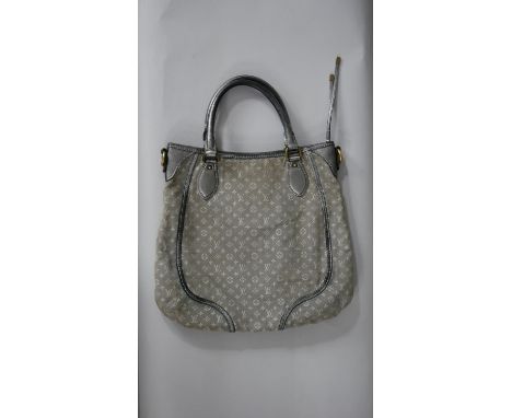 A vintage Louis Vuitton Idylle tote bag in monogram canvas and leather, gray color, hardware in gilt metal, double handle in 