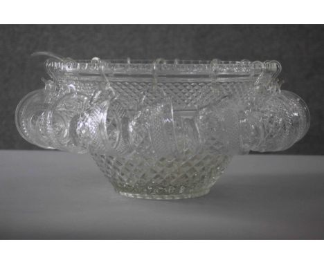 A large vintage pressed clear glass punch bowl with fifteen cups and ladle. H.22 Diameter. 46 cm. 