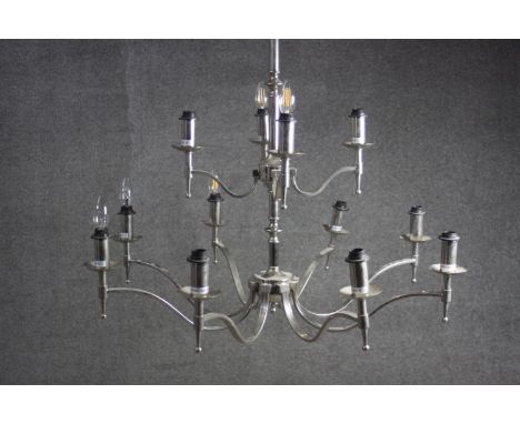 A contemporary twelve branch chrome chandelier. H.70 Diameter. 95cm. 