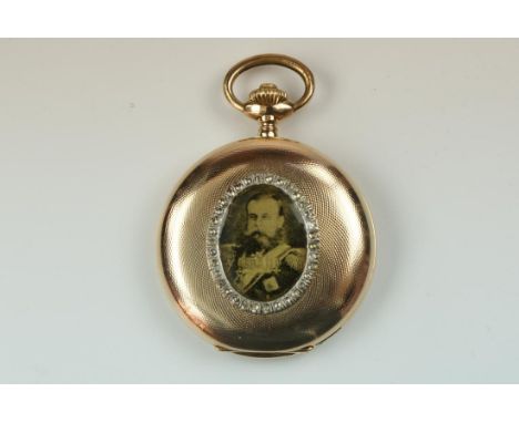 14ct gold hunter pocket watch by TAVANNES with miniature on the front of the case depicting a Russian Commander. With origina