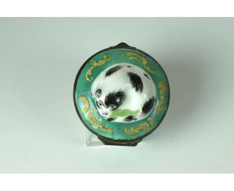 A Fine Bilston Enamel Black and White Cat Bonbonniere c1780 with steel mirror so can be used as a patch box The lid moulded i