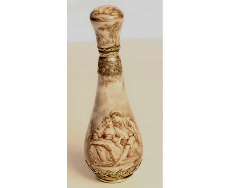A French enamel perfume bottle , with pieced silver mount to neck and base in an attractive monochrome colour with a hint of 