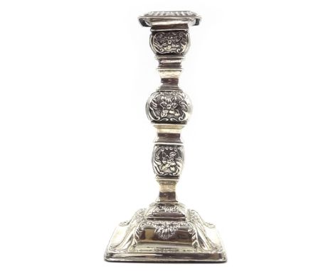 Victorian silver embossed candlestick by William Hutton & Sons Ltd, Birmingham 1899, filled H18cm Condition Report Click here