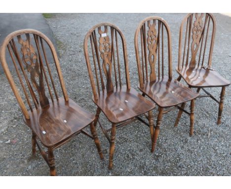 Set of four stick back dining chairs on turned supports 