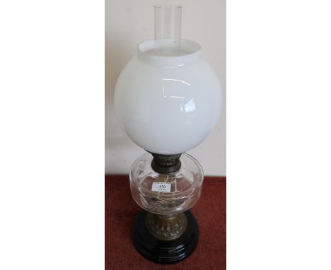 Late Victorian oil lamp with turned base and clear glass reservoir with opaque glass shade 