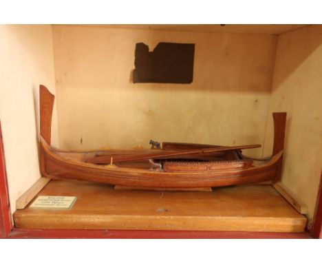 Cased scale model of a Maltese passenger boat (Dghajsa), gondola style model (overall length 38cm) 