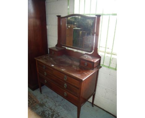Edwardian mahogany inlaid dressing table, shaped bevelled edge swing mirror over two trinket drawers, two short and two long 