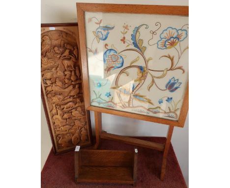 Carved oak panel depicting various birds and wildlife marked The Falina of Northumbria, an oak framed firescreen with needlew