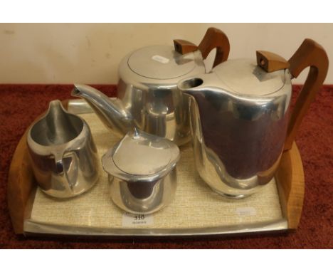 Picquot ware five piece tea set comprising of twin handled tray, teapot, hot water jug, milk jug and sugar basin 