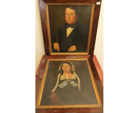 Pair of 19th C rosewood framed oil on canvas head and shoulder portrait of a lady and gentleman (67cm x 78cm) 