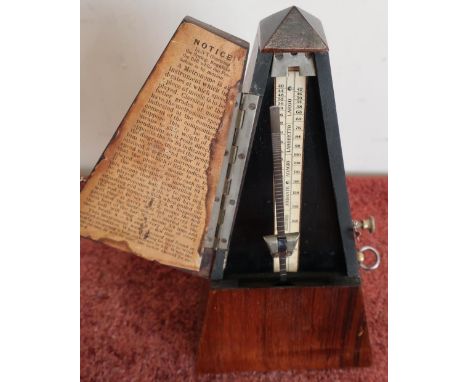 Rosewood cased Metronome with label to the front 